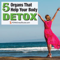 Woman in pink dress with arms in the air facing the ocean with overlay: 5 Organs That Help Your Body Detox