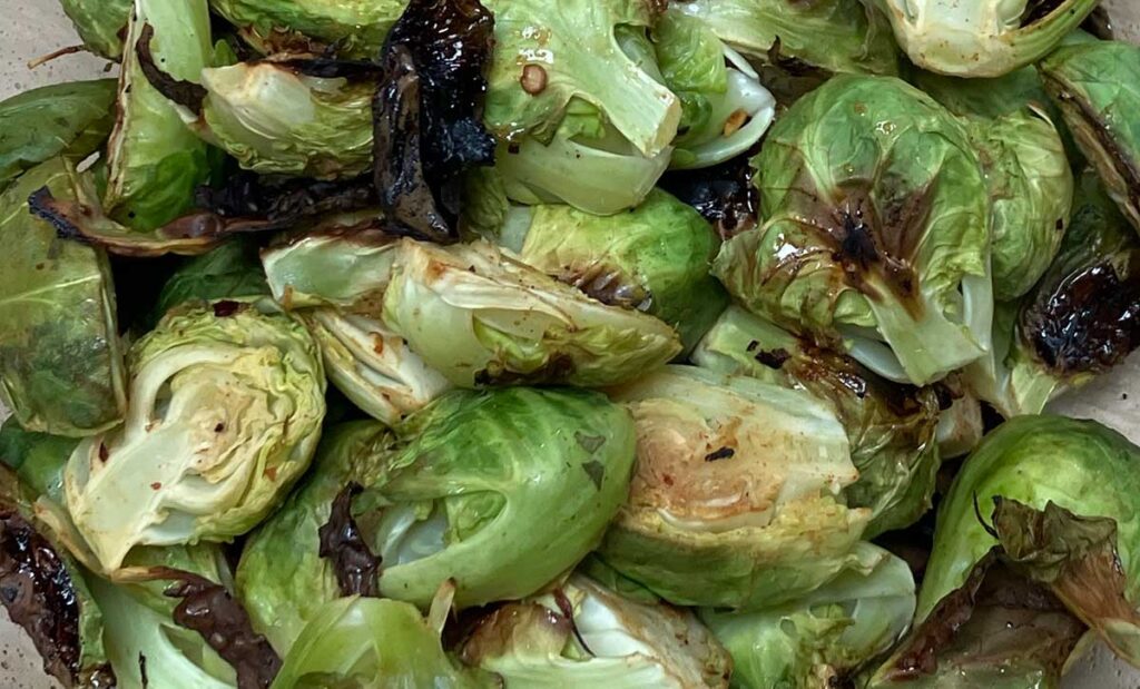 Closeup of roasted Brussels sprouts.