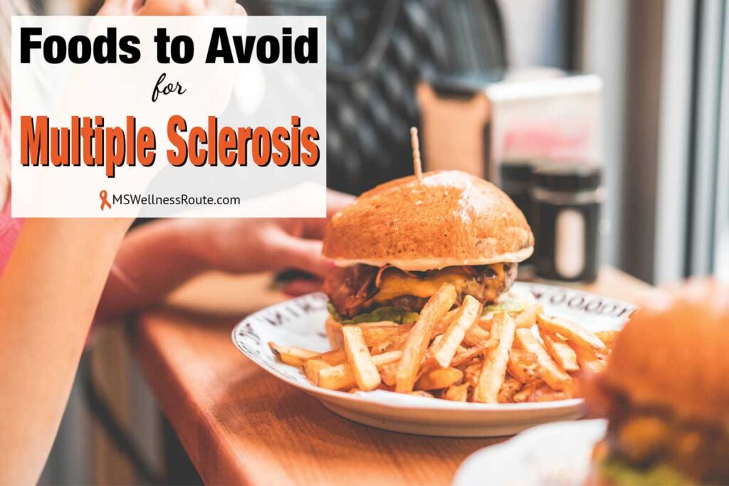 Woman eating a hamburger with overlay: Foods to Avoid for MS