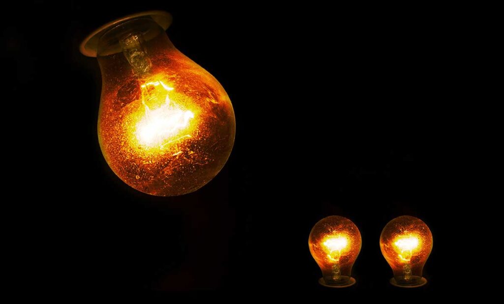 Three incandescent lightbulbs.