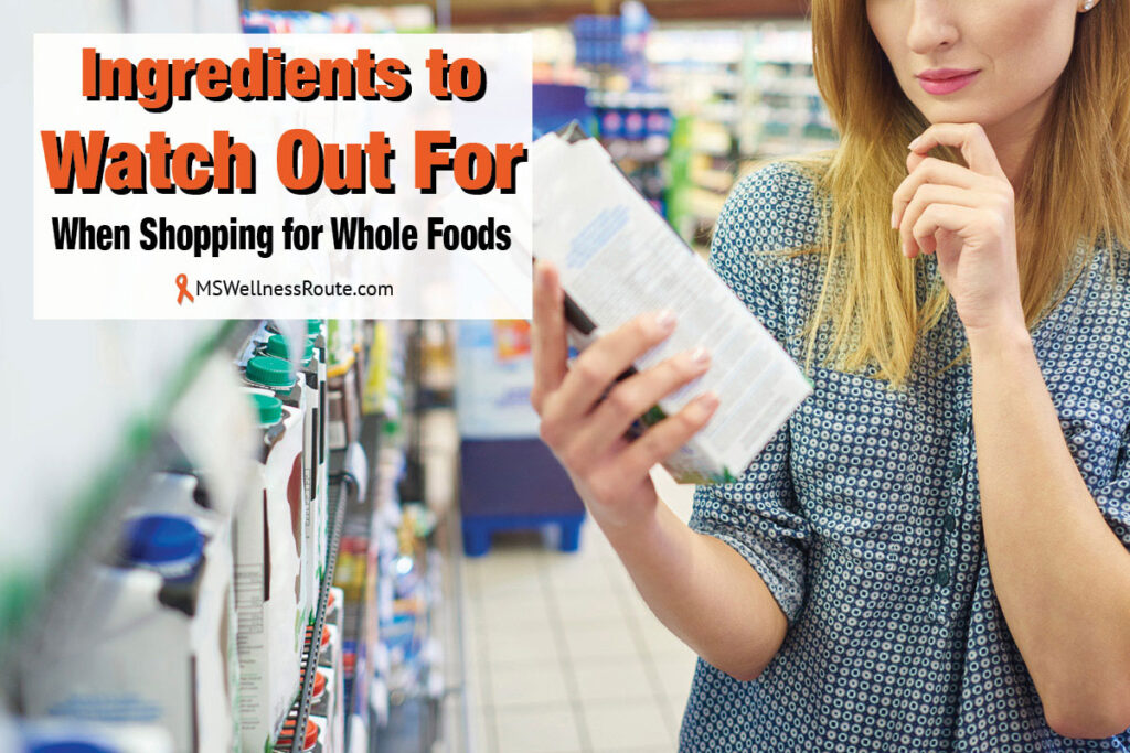 Woman reading label on back of almond milk with overlay: Ingredients to Watch Out For When Shopping for Whole Foods