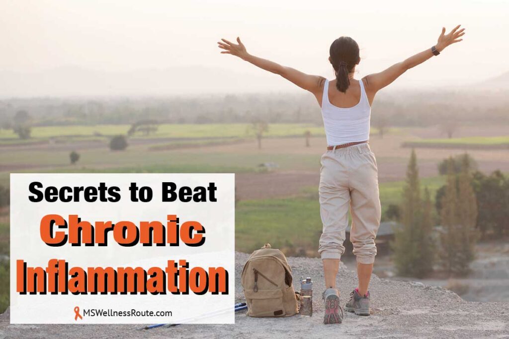 Woman overlooking valley with arms in air with overlay: Secrets to Beat Chronic Inflammation