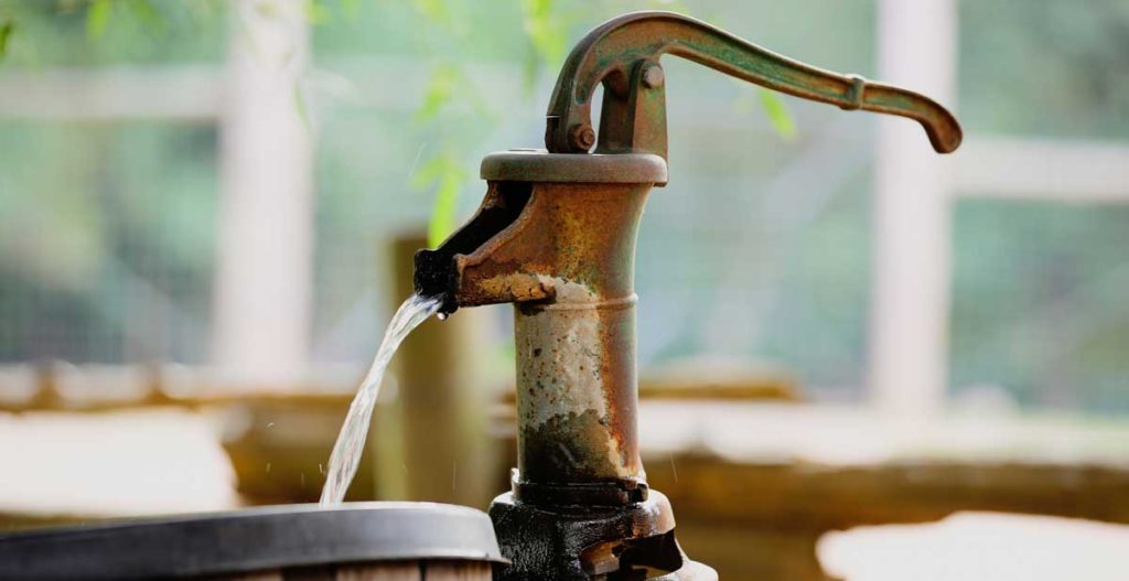 Water flowing from well water hydrant.