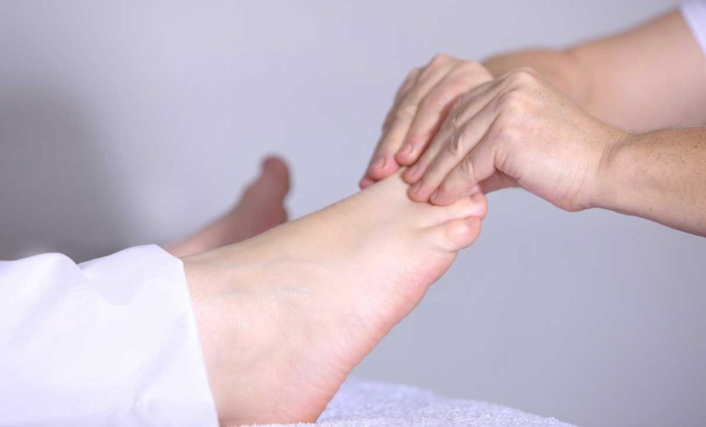 Woman getting a foot massage.